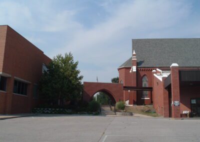 A parking lot next to a church.